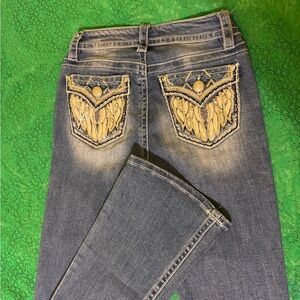 Elegant Blue Boot Cut Jeans with Embroidered Pockets